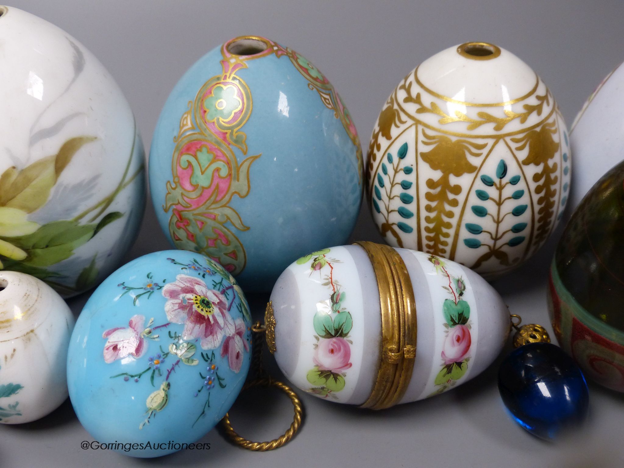 Assorted 19th/20th century Russian painted and gilded porcelain Easter eggs